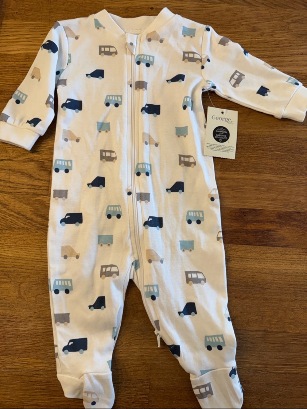 George White Footed One-Piece with Blue and Gray Vehicle Print